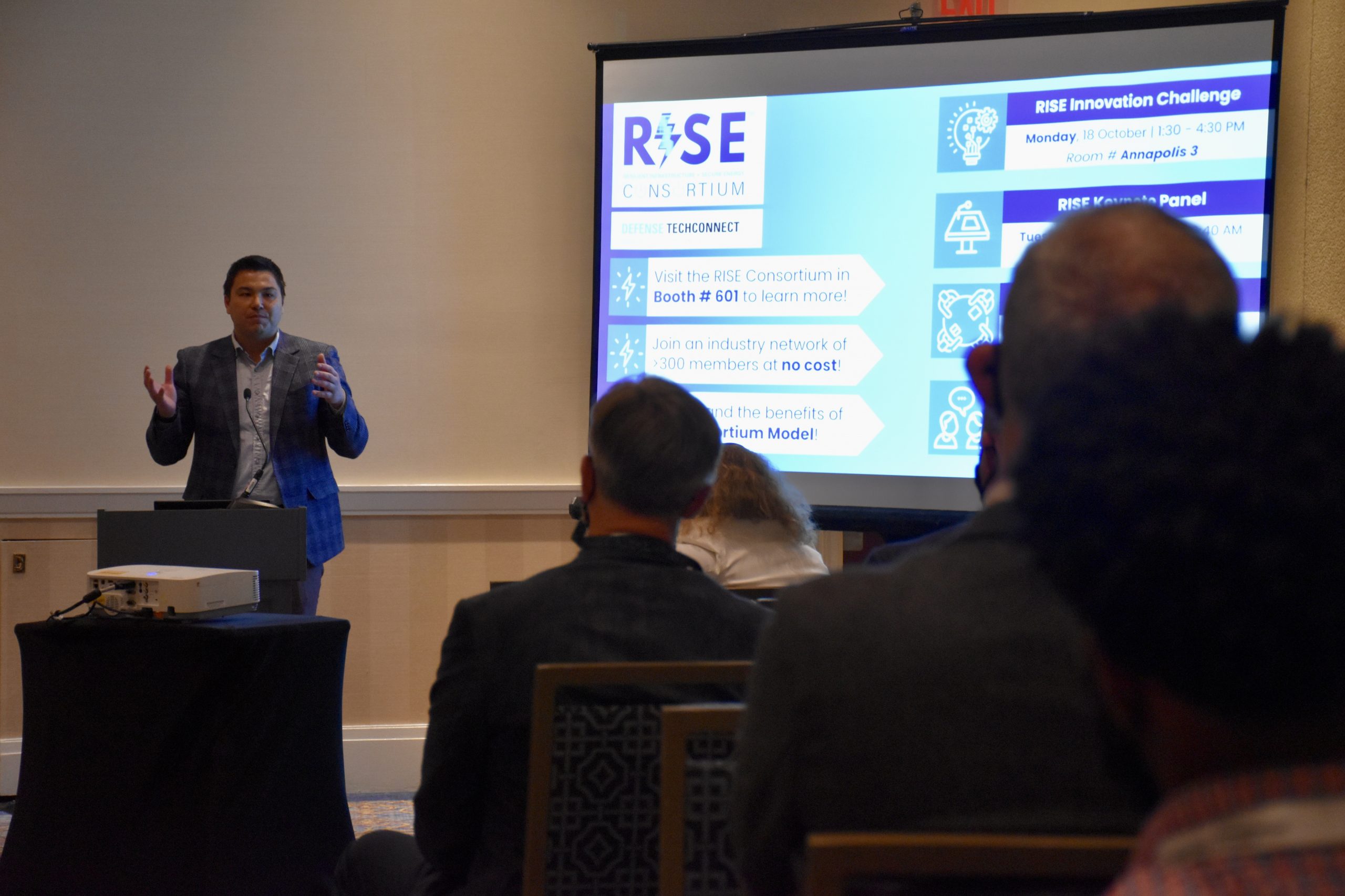Michael Wu (at podium), RISE Consortium Executive Director, moderated the RISE Member Meeting, Oct. 19 at the Gaylord National Resort & Convention Center in National Harbor, MD.